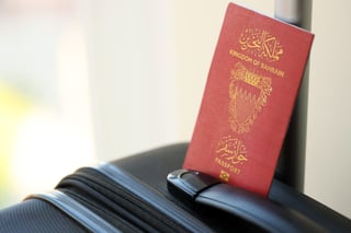 Bahraini passport on travel luggage