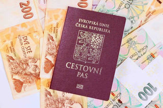 czech banknotes money of various czk koruna denomination with czech passport