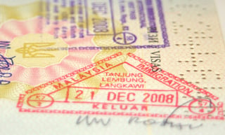 page of passport with malaysian customs stamp